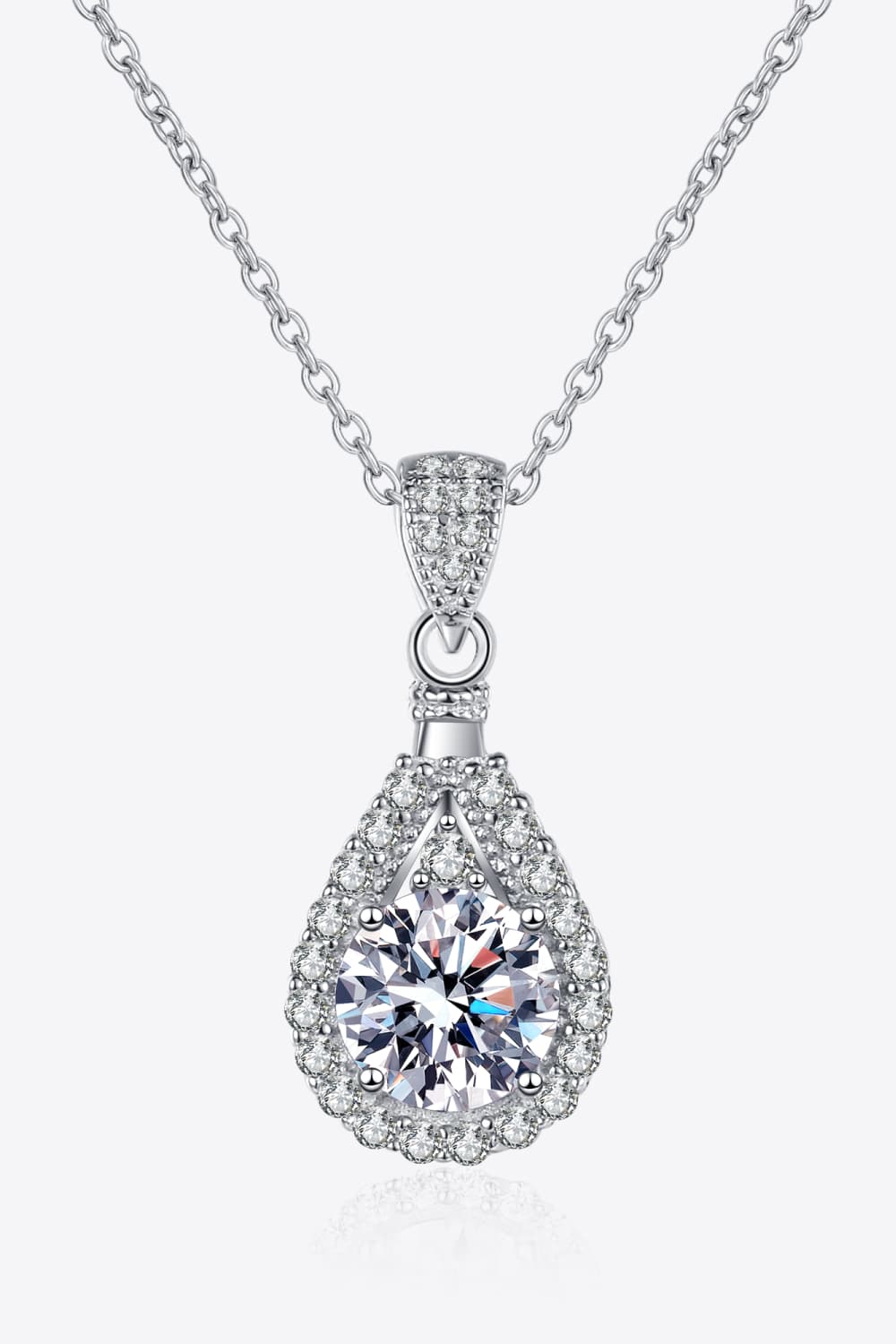 "Minimalist Moissanite pendant made with 925 sterling silver and rhodium-plated, featuring a 2-carat Moissanite stone. Includes a certificate of stone properties, matching box, and has a 16-inch chain with a 2-inch extension."