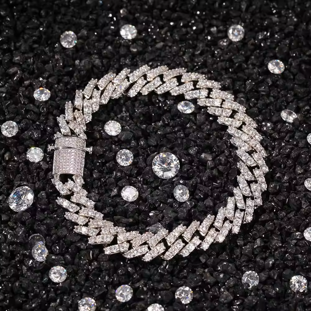 "NEW Design 9mm CZ Cuban Bracelet in silvery tone, made with premium brass and micro-insert CZ stones, featuring an intricate Cuban link pattern. Suitable for various occasions and designed for all genders."
